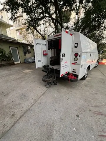 Magnet Plumbing service vehicle on-site for Grease Trap Cleaning in Lakeland South